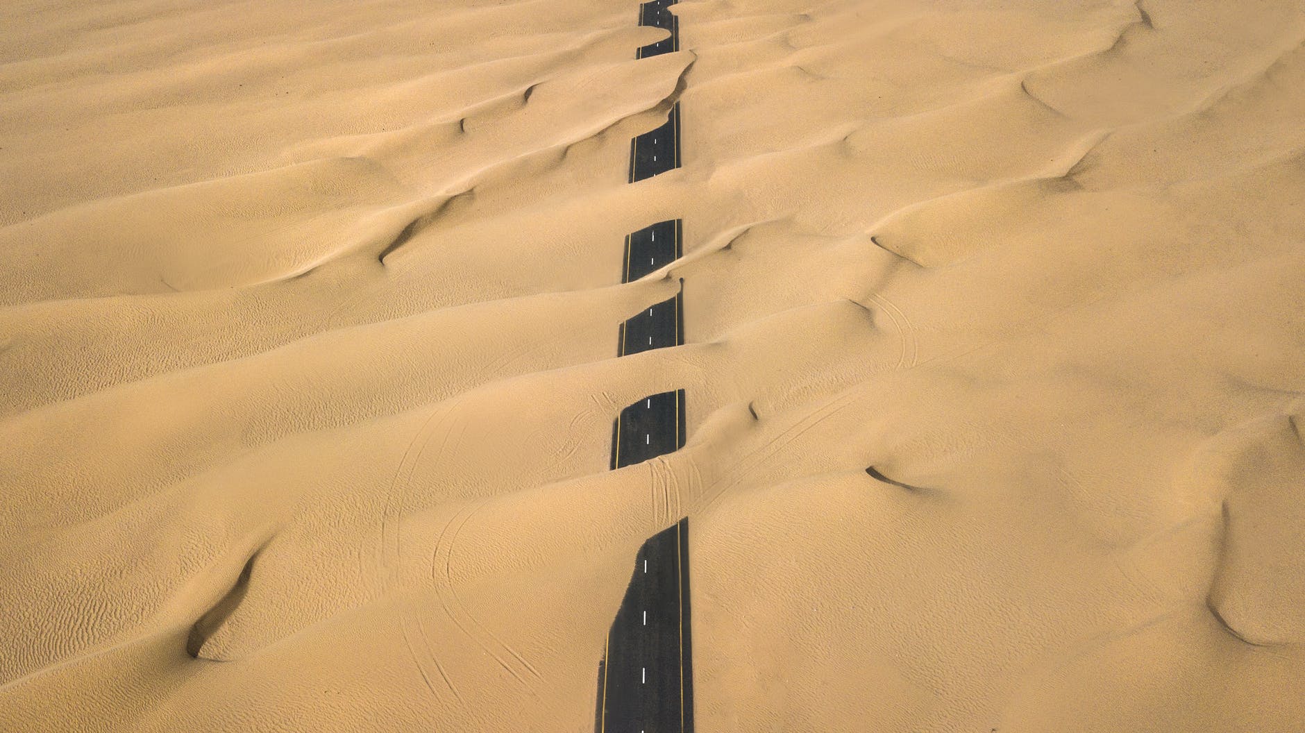 road covered with sand