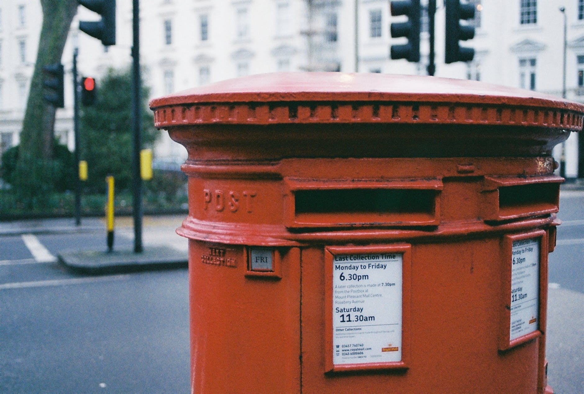 oblong brown metal mailbox